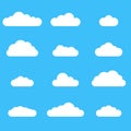 Clouds icon set. Different cloud shapes isolated on the blue sky background. Vector illustration. Royalty Free Stock Photo